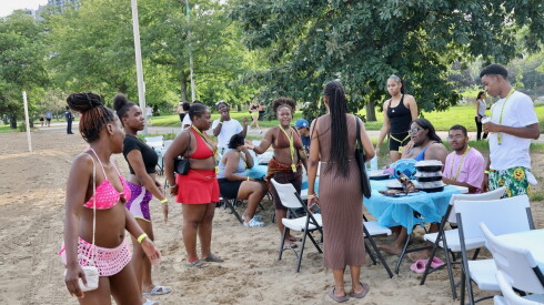 Teens on a beach for an end-of-summer party
