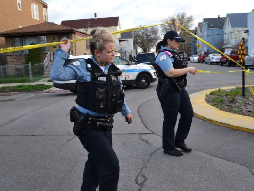 Officers investigate a shooting early Friday that wounded an ATF agent in the Back of the Yards neighborhood | Justin Jackson/Sun-Times
