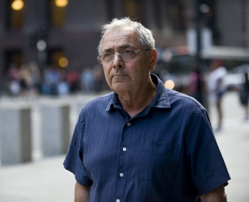 Alexander Igolnikov, 67, of Northbrook, leaving the Dirksen Federal Building after his arrest last September. | Sun-Times file photo