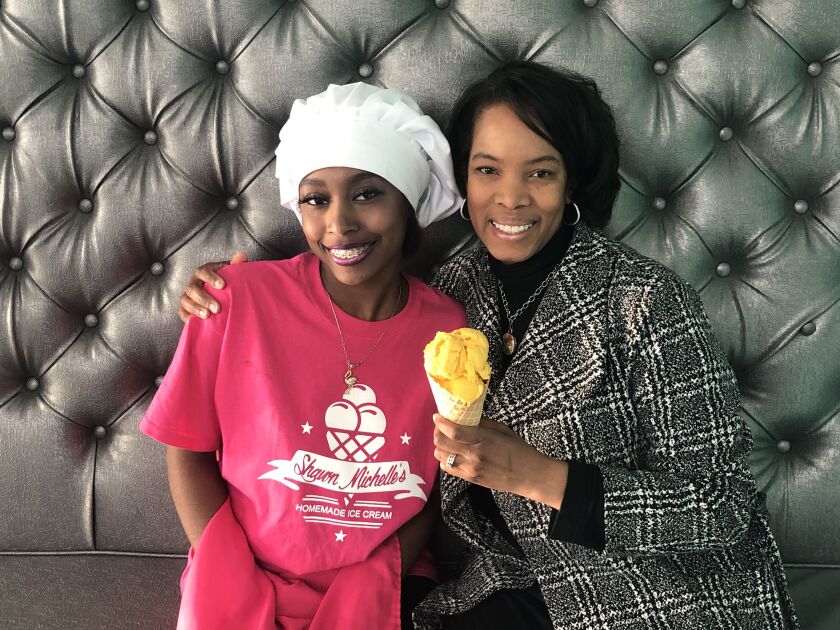 Shawn Michelle’s Homemade Ice Cream co-owner Nataki Muhammad with her oldest daughter Emani Muhammad, who works as a manager at the shop. | Ji Suk Yi/Sun-Times