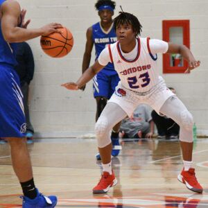 Curie’s Ramean Hinton (23)plays defense against Bloom, Saturday 12-29-18. Worsom Robinson/For Sun-Times