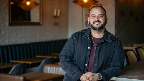 Chef Zubair Mohajir stands inside Mirra restaurant.