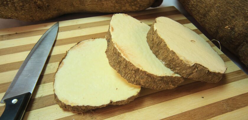 The flesh of a yam you would find in the store in the U.S. is typically white or yellow, but there are some notable exceptions.