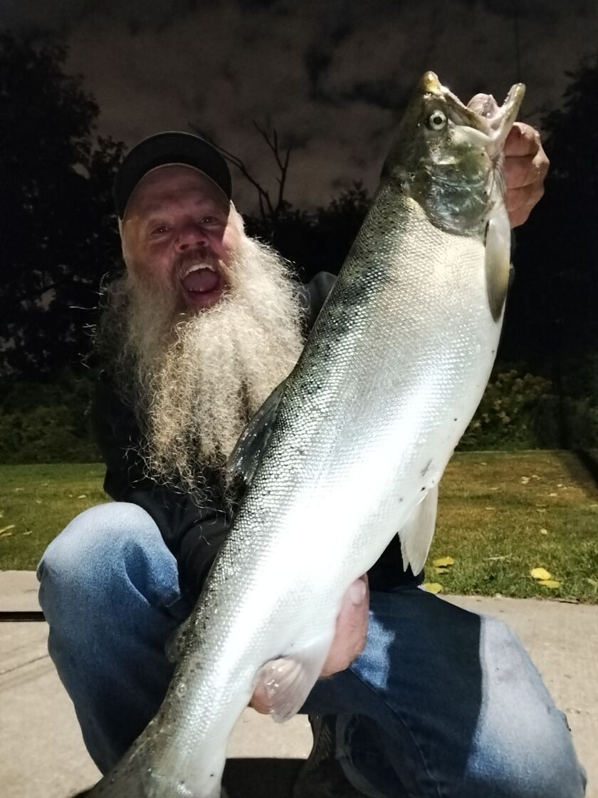 Tim “Spike” Davis finding late-night success on salmon at Montrose Harbor. Provided phot