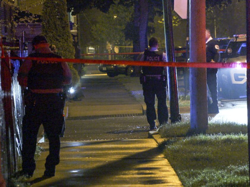 Police investigate a shooting Friday in the 7200 block of Euclid Avenue in Chicago. | Justin Jackson/ Sun-Times