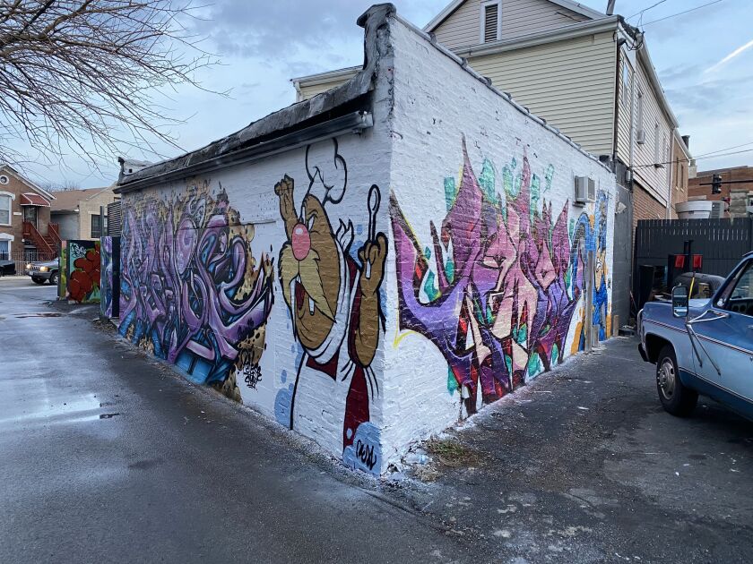 This piece by Won Kim, KOMF_ONE and DEAL showcases a mixture of graffiti art and cartoon characters. This mural popped up in late 2019 at the Bridgeport restaurant Kimski.