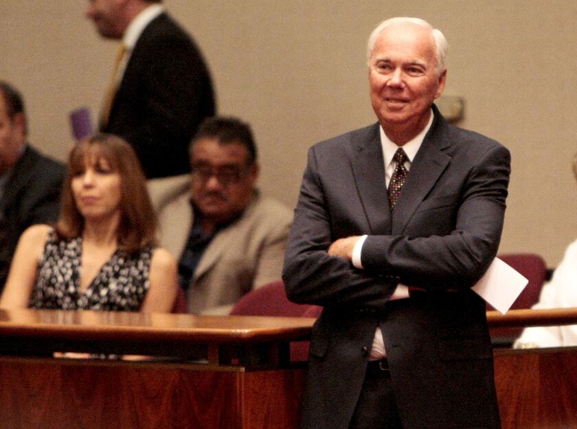 Former Ald. Richard Mell listens as his daughter, Ald. Deb Mell (33rd Ward) speaks during a Chicago City Council meeting in September 2013.