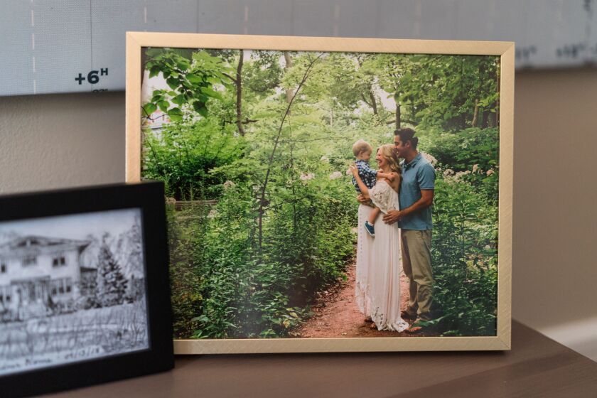 A family photo of Noel and Kate Weidner, with their son Gus, taken when Kate Weidner was pregnant with Everett. | Max Herman/For the Sun-Times