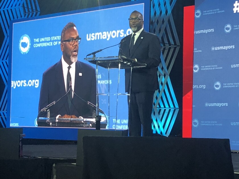 Mayor Brandon Johnson addressing the U.S. Conference of Mayors on Sunday in Washington.