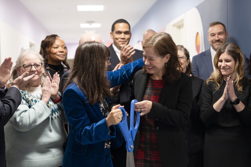 Dana Weiner, who is chief officer for Children’s Behavioral Health Transformation in the Office of Governor J.B. Pritzker, cuts the ribbon with Heidi E. Mueller, who is director of the Illinois Department of Children and Family Services, at the expanded inpatient psychiatric unit for youth with autism and intellectual and developmental disabilities at Ann & Robert H. Lurie Children’s Hospital of Chicago.