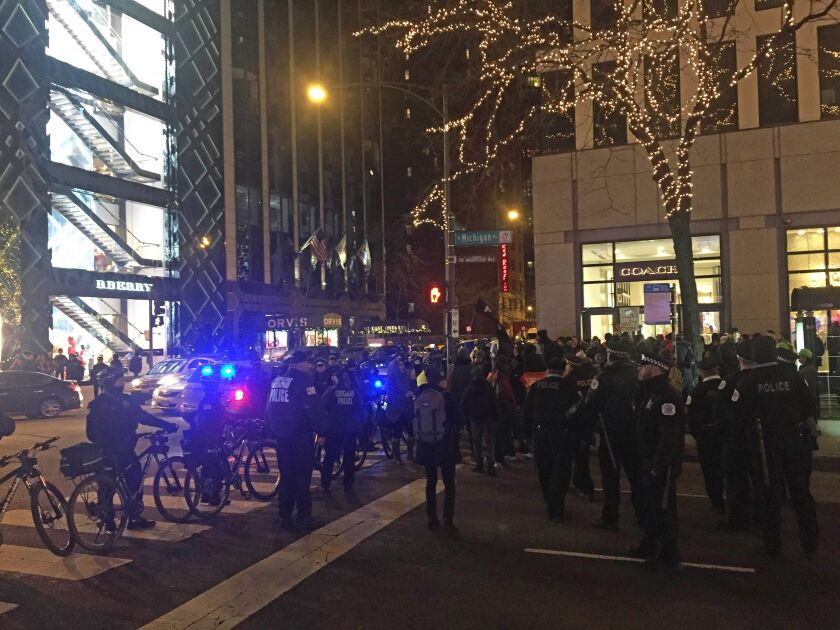 Protesters marched west for awhile before returning to Michigan Avenue. | Mitchell Armentrout/For the Sun-Times