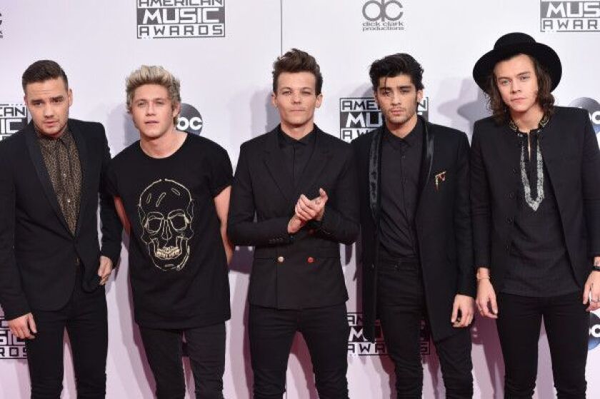 Liam Payne, from left, Niall Horan, Louis Tomlinson, Zayn Malik and Harry Styles of the musical group One Direction arrive at the 42nd annual American Music Awards at Nokia Theatre in Los Angeles in 2014. | Photo by John Shearer/Invision/AP, file)
