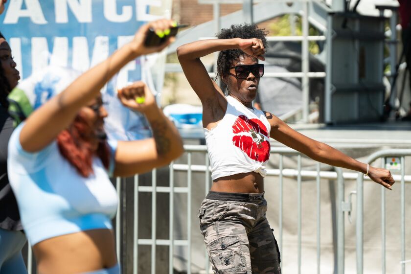 Festival goers dance during the Chicago House Music Festival and Taste of Chicago Humboldt Park in the Humboldt Park neighborhood, Saturday, June 24, 2023.