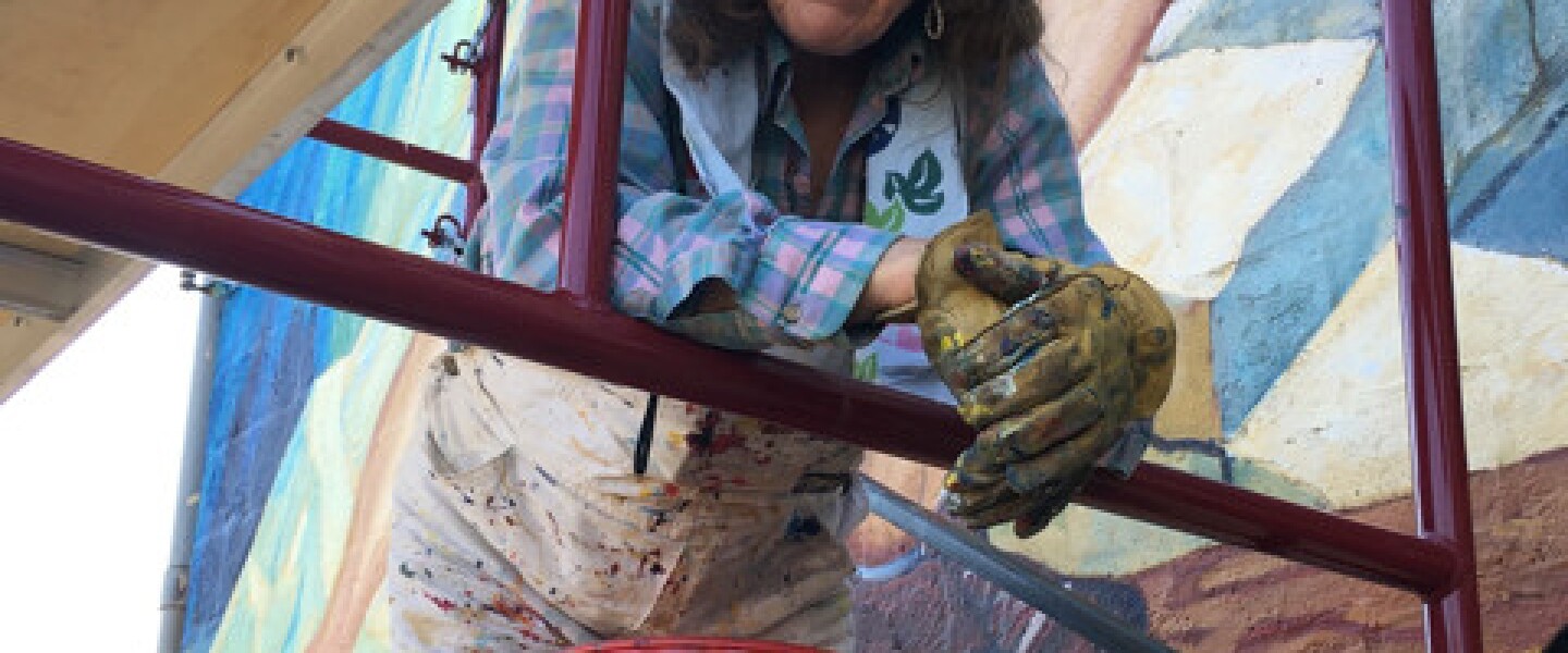 Caryl Yasko in Lemont to do her latest restoration of “Lemont Quarry Workers.”