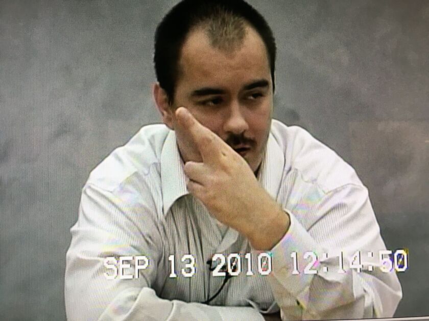 T.J. Jimenez flashes the Simon City Royals gang sign.