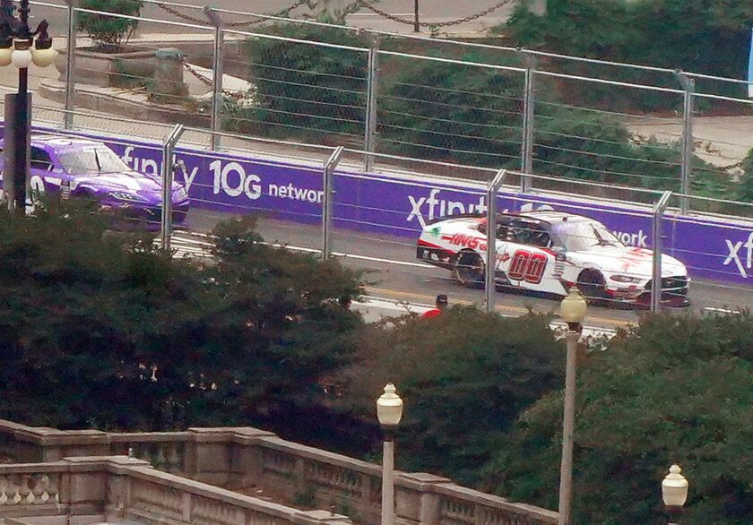 Cole Custer (00) leads John Nemechek (20) during ‘The Loop 121’ race Saturday.