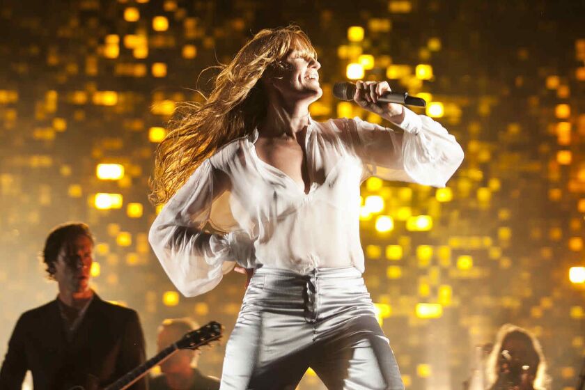 Florence Welch, of Florence and the Machine, performs at Lollapalooza in 2015. The singer brings her show to the United Center this weekend. | Ashlee Rezin/Sun-Times