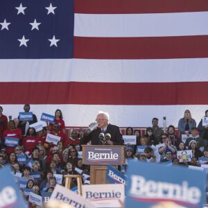 Presidential candidate Bernie Sanders takes a sip of water mid speech, during his rally in Grant Park, Saturday, March 7, 2020.