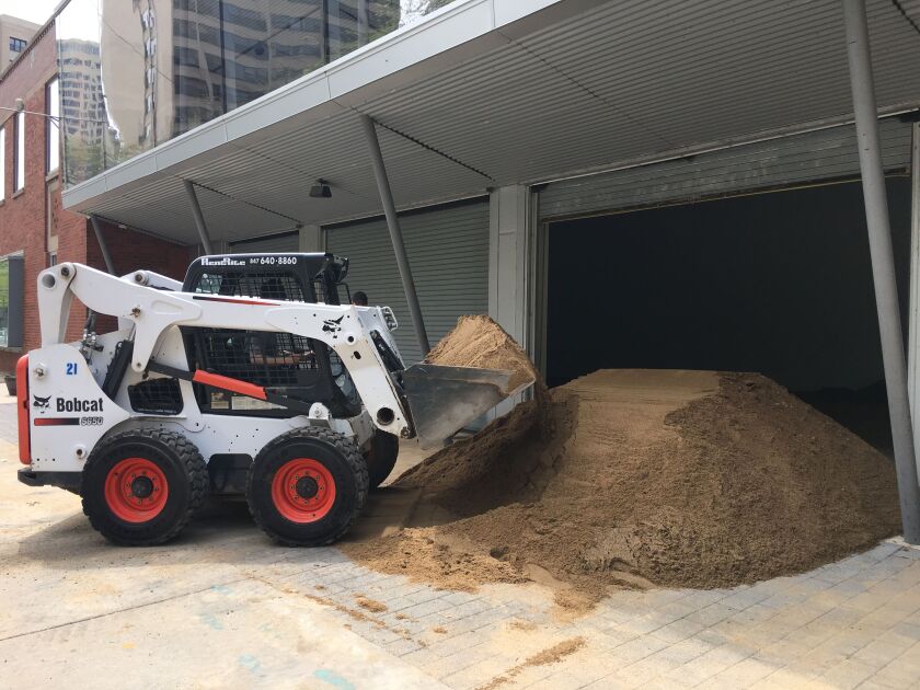 The exhibit will feature 40 tons of sand and a wooden boardwalk representing the beach of the fabled Chicago Beach Hotel during the 1893 World’s Columbian Exposition. | Jacob Wittich/Sun-Times