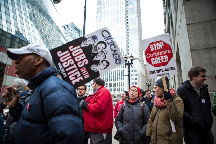 Supporters of the University of Illinois Graduate Employees Organization rally and march to implore members of the UIC board for a conversation about the ongoing GEO strike, Tuesday, March 6th, 2018. | James Foster/For the Sun-Times