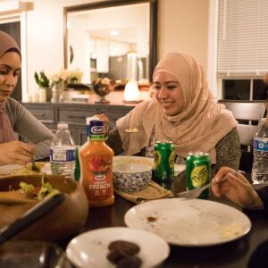 With Mexican culture still very much intact, recent Islamic converts Maria Ontiveros, Felicia Salameh and Jessica Salgado all eat enchiladas for their Iftar meal on June 5, 2018 in Orland Park, IL. This breaks their Ramadan fast, where there is no food or