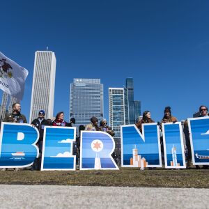 Bernie Sanders supporters wait in Grant Park with giant letters that spell “Bernie”, ahead of the Bernie Sanders rally, Saturday, March 7, 2020.