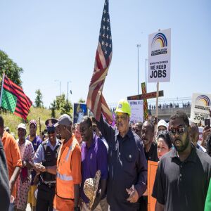 The Rev. Jesse Jackson marches alongside the Rev. Michael Pfleger. | Ashlee Rezin/Sun-Times