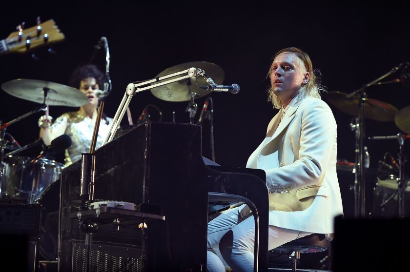 Regine Chassagne and Win Butler of Arcade Fire perform onstage at the 2016 Panorama NYC Festival on July 22, 2016 in New York City. They’ll be at Lollapalooza on Aug. 6. (Photo by Theo Wargo/Getty Images)