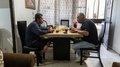 Gonzalez-Jasso has breakfast at his brother's house in February.