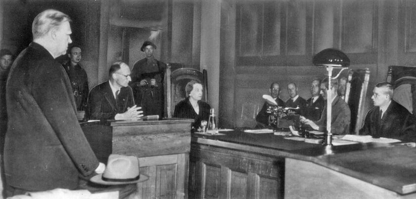 Vidkun Quislin (left) stands in the dock during a June 1945 court hearing in Oslo, Norway, where he was on trial for treason.