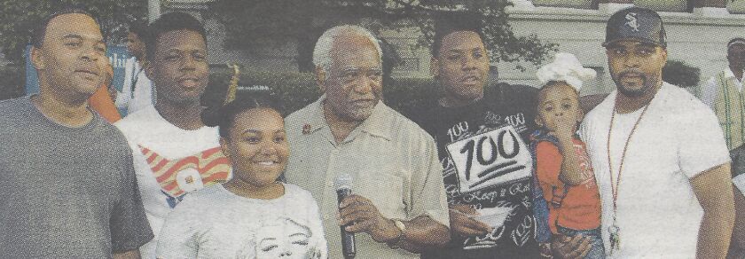 Javon Wilson (second from left) with his grandfather, U.S. Rep. Danny Davis (center). | Photo provided by Tumia Romero