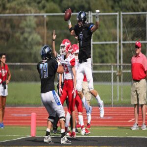 Lincoln-Way East’s Chase Anderson (7) celebrates with Anthony Sottosanto. Allen Cunningham/For the Sun-Times.