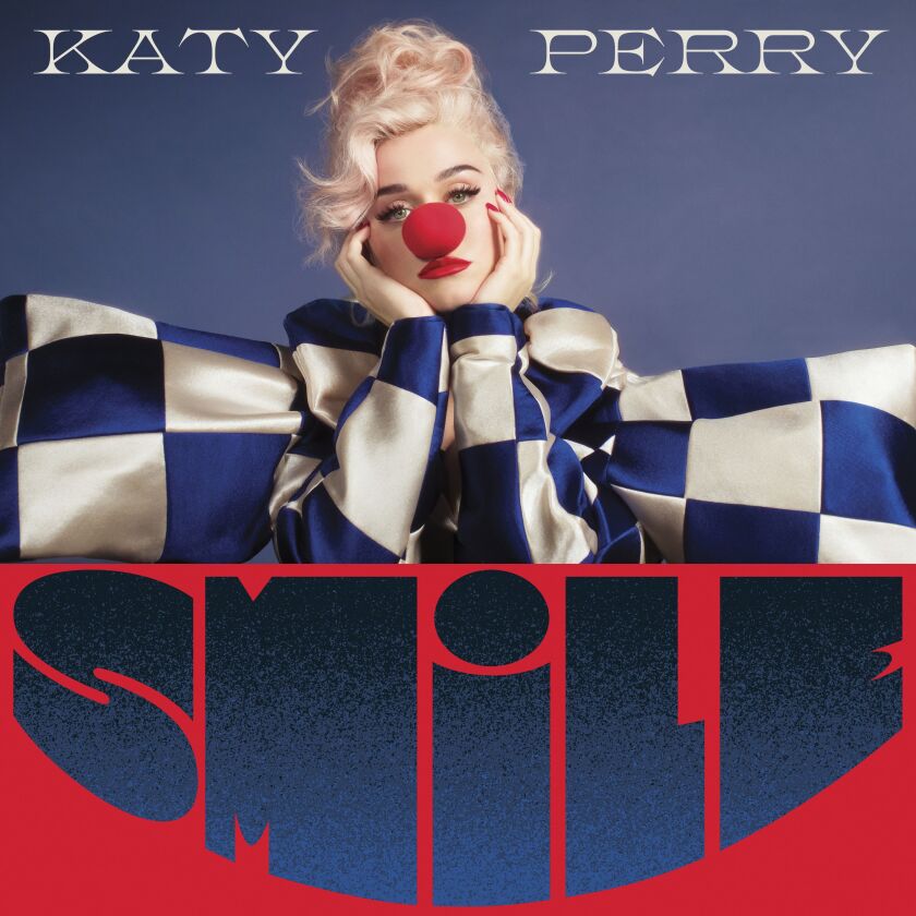 This cover image released by Capitol Records shows “Smile” the latest release by Katy Perry. It’s her fifth major-label album.