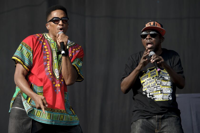 In this July 14, 2013 file photo, Q-Tip, left, and Phife Dawg from A Tribe Called Quest perform during the Wireless Festival at the Queen Elizabeth Olympic Park in London. AP file photo