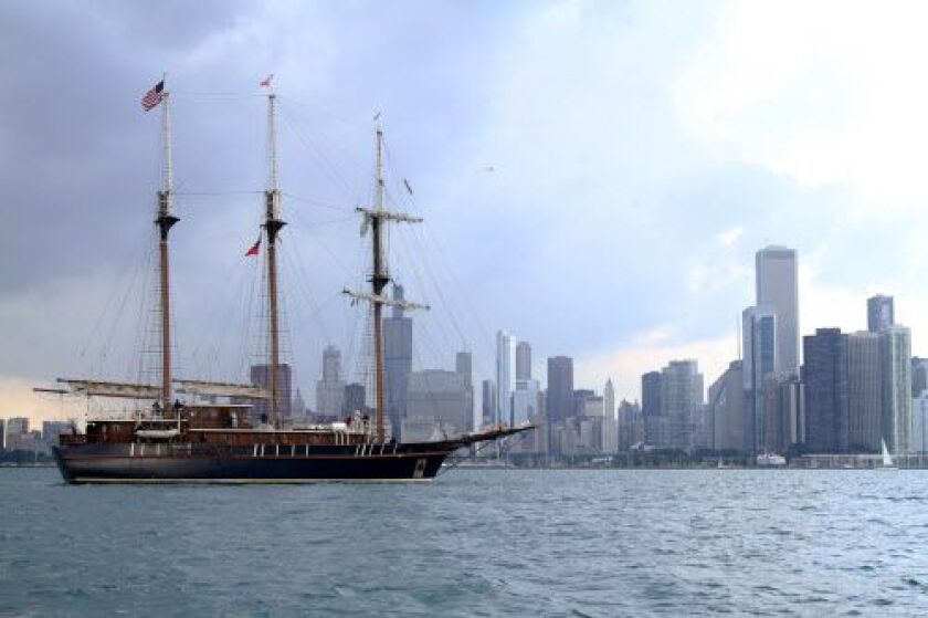 The Peacemaker cruises along the Chicago skyline on the first day of the 2013 Tall Ships event. | Melissa Klauda for Sun-Times Media