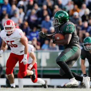 Glenbard West’s Jaylen Moore (23) runs the ball against Hinsdale Central.