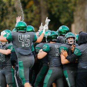 Glenbard West celebrates after winning the game against Hinsdale Central.