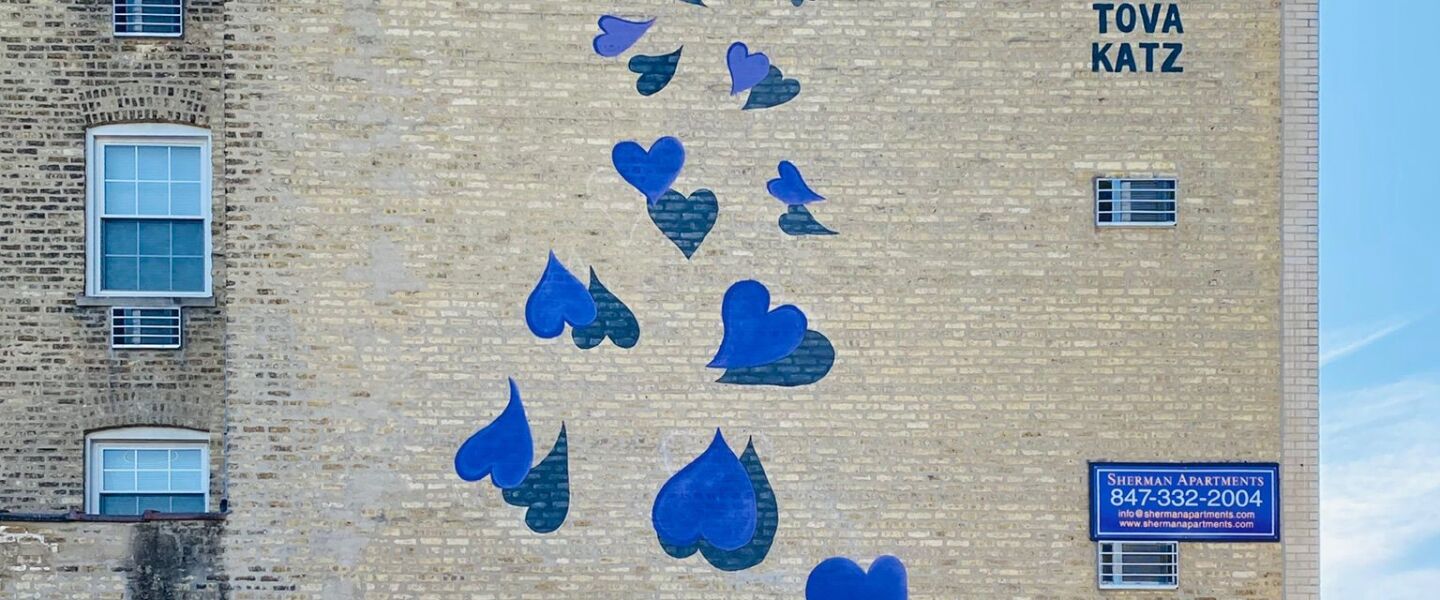 Ryan Tova Katz’s four-story mural “Purple Hearts,” near the CTA’s Foster Avenue L station on the Purple Line in Evanston, which she painted last year.