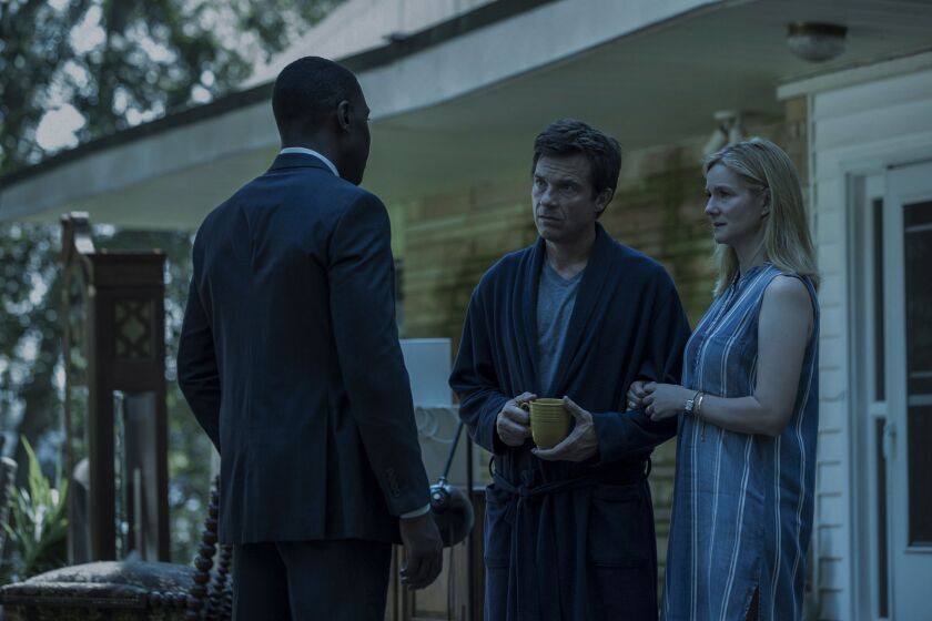 Key moments in the Netflix series “Ozark” (with, from left, McKinley Belcher III, Jason Bateman and Laura Linney) were shot in Chicago. | Netflix