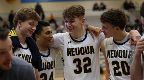 Neuqua Valley's (L-R) Mason Martin, Carter Coviello, Cole Kelly, and Luke Balgro after the Wildcats defeat Yorkville Christian 74-43.