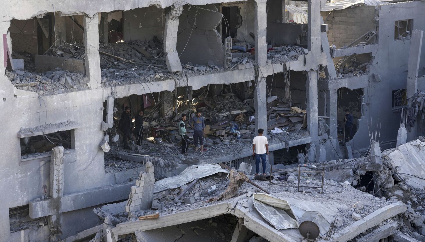 NextImg:Qatar says Gaza cease-fire will begin Friday morning, with aid to follow ‘as soon as possible’