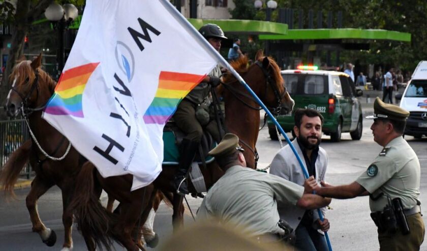 Demonstrators from the gay community protest against “abuses by the church” during the visit by Pope Francis, in the center of Santiago, on January 15, 2017. | Ariel Marinkovic/AFP/Getty Images