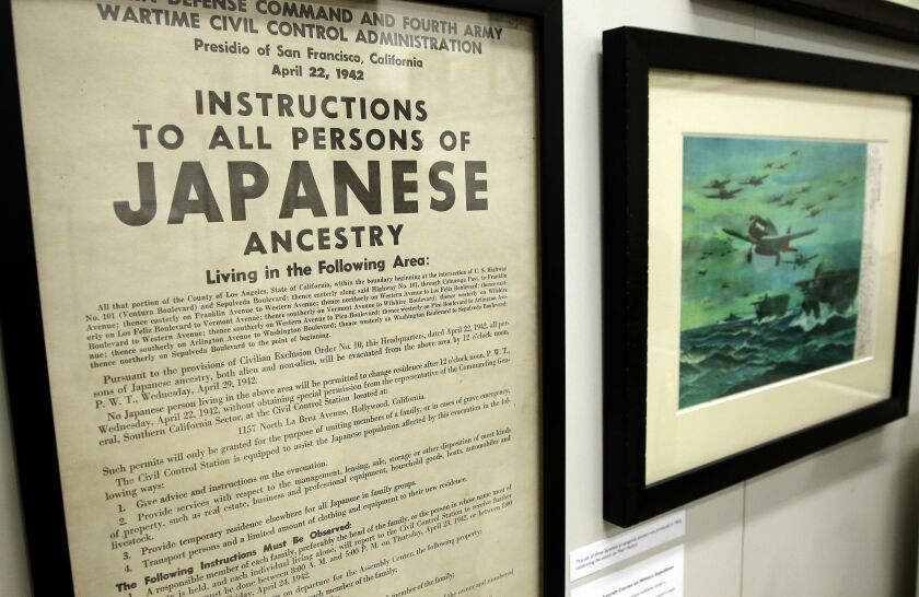 A 1942 U.S. wartime poster that issues instructions to people of Japanese ancestry is on display as part of an exhibit at The Museum of World War II, Boston, in Natick, Mass. (AP Photo/Steven Senne)