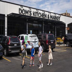 Customers shop on the opening day of Dom’s Kitchen and Market at 2730 N. Halsted St. in Lincoln Park on the North Side, Tuesday morning, June 8, 2021
