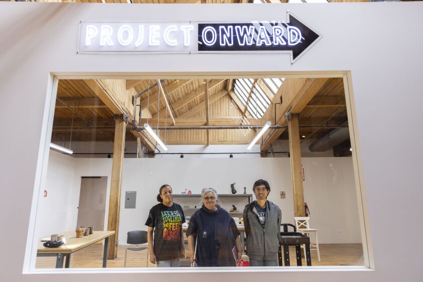 Cheryl Booker (left to right), Executive Director Nancy Gomez and Jeanno Juguilon inside the Project Onward Ceramics studio space at 1200 West Bridgeport Art Centre. A pottery workshop in the art center.