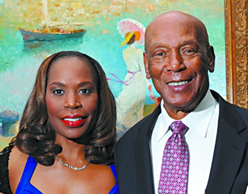 <strong>Ernie Banks and his wife, Liz, at an event in 2010. | Sun-Times file photo</strong>