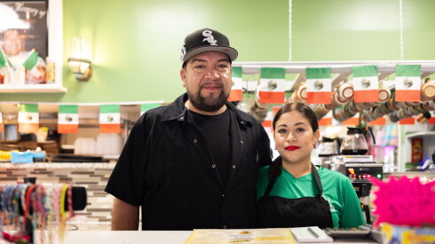 Jose Luis Lopez stands behind the counter with his wife Clarita at Los Candiles Restaurant