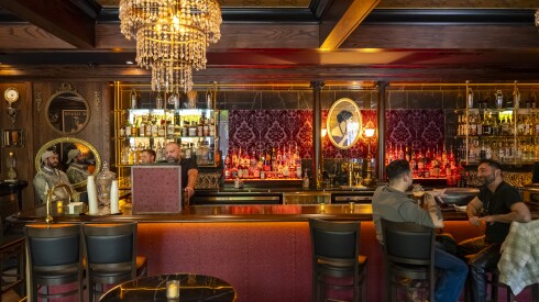 Customers sit at the bar inside Marty's Martini Bar in Andersonville.