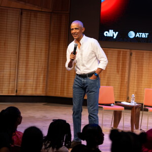 Former President Barak Obama surprises a group of high school freshman girls Friday during the WNBA Changemaker Day at the Obama Presidential Center in Jackson Park on the South Side.
