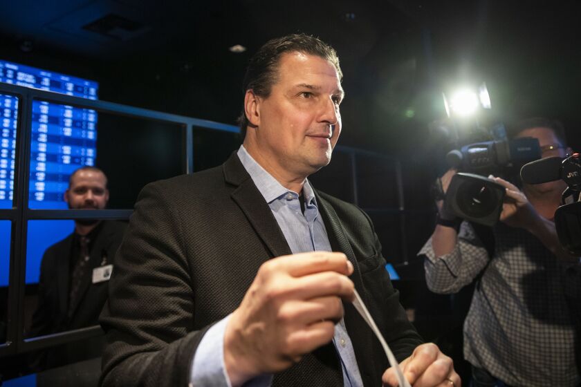 Blackhawks announcer Eddie Olczyk makes Illinois’ first sportsbook wager and puts $100 down on his hometown White Sox to win the American League pennant March 9 at Rivers Casino.